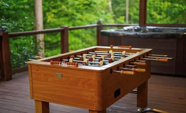 exterior space with an outdoor hot tub