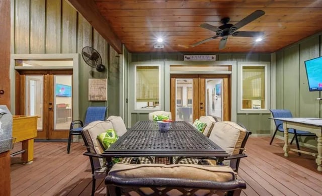 exterior space featuring french doors, outdoor dining area, and ceiling fan