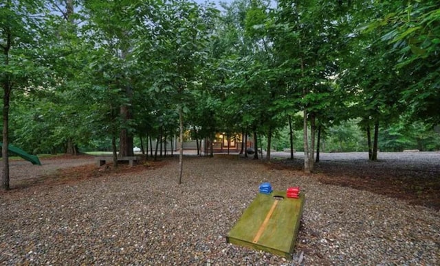 view of community featuring playground community