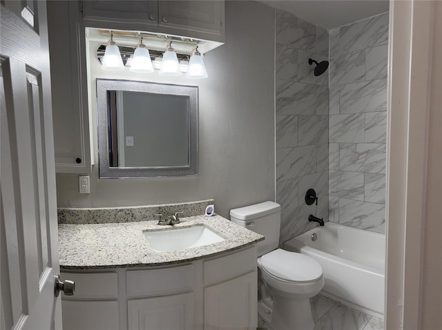 full bathroom featuring bathtub / shower combination, vanity, marble finish floor, and toilet