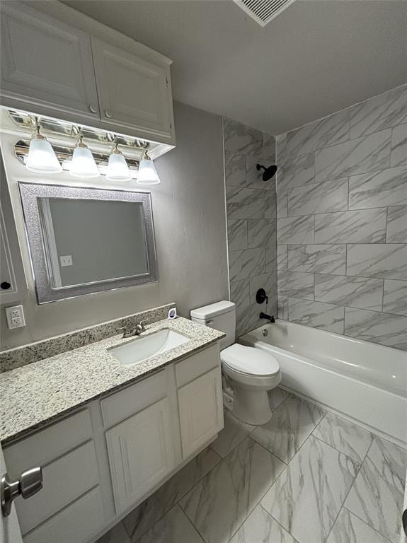 bathroom featuring vanity, visible vents,  shower combination, toilet, and marble finish floor