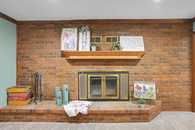 room details with carpet floors, a brick fireplace, and crown molding