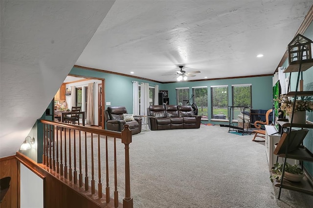 living room with recessed lighting, carpet floors, crown molding, and ceiling fan