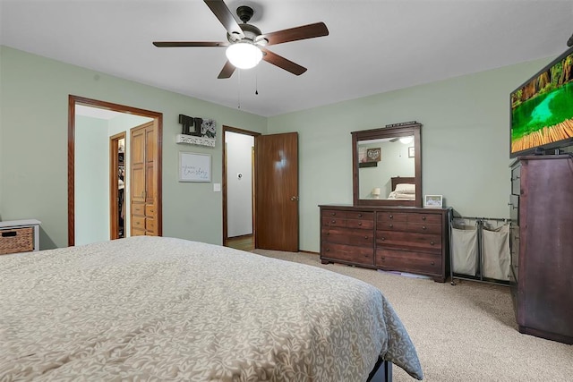 bedroom with carpet flooring and a ceiling fan