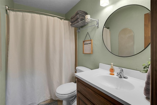 full bath with vanity and toilet
