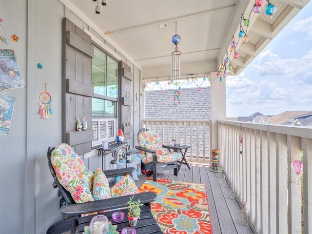 1924 Plaza District Dr, Edmond, OK 73034 - wooden deck featuring covered porch