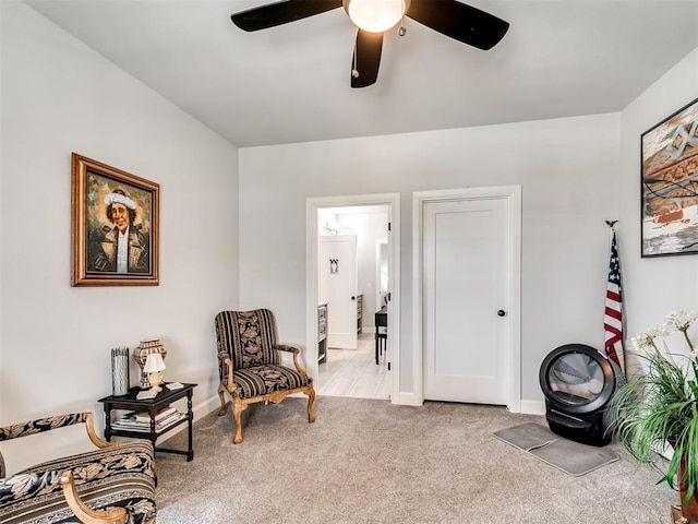 1924 Plaza District Dr, Edmond, OK 73034 - living area with baseboards, carpet flooring, and ceiling fan