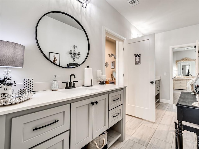 1924 Plaza District Dr, Edmond, OK 73034 - full bath with visible vents and vanity