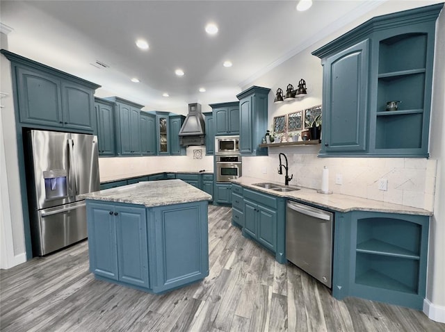 2809 Morgan Trace Rd, Yukon, OK 73099 - kitchen with open shelves, appliances with stainless steel finishes, a sink, blue cabinetry, and crown molding