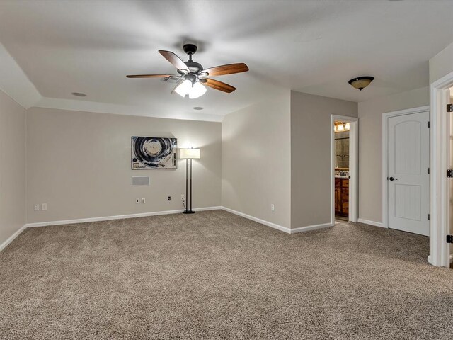 2809 Morgan Trace Rd, Yukon, OK 73099 - empty room with carpet flooring, ceiling fan, and baseboards