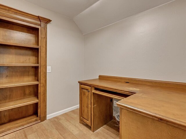 2809 Morgan Trace Rd, Yukon, OK 73099 - unfurnished office featuring light wood-style flooring, vaulted ceiling, and baseboards