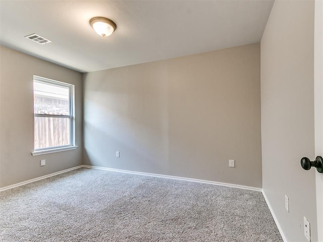 3721 Central Park Dr, Moore, OK 73160 - spare room with carpet floors and baseboards