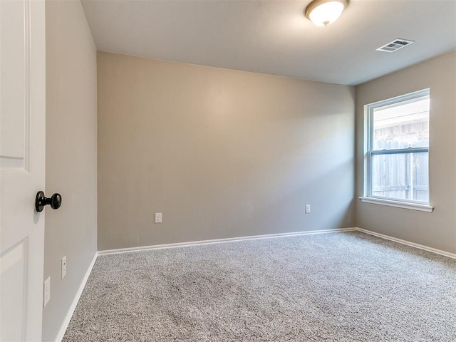 3721 Central Park Dr, Moore, OK 73160 - spare room with carpet flooring and baseboards