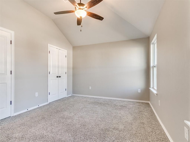 3721 Central Park Dr, Moore, OK 73160 - unfurnished bedroom featuring vaulted ceiling, carpet flooring, baseboards, and a ceiling fan