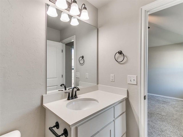 3721 Central Park Dr, Moore, OK 73160 - bathroom with vanity and a textured wall