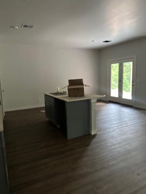 11767 Sweeping Ln, Guthrie, OK 73044 - unfurnished office featuring dark wood-style floors and baseboards