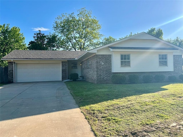 ranch-style home with driveway, an attached garage, a front lawn, and brick siding