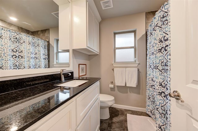 bathroom with vanity, visible vents, curtained shower, and toilet