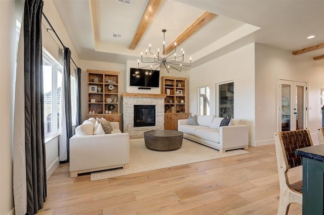 3824 Stone Hill Ln, Edmond, OK 73034 - living room featuring beam ceiling, healthy amount of natural light, a chandelier, light wood-type flooring, and recessed lighting