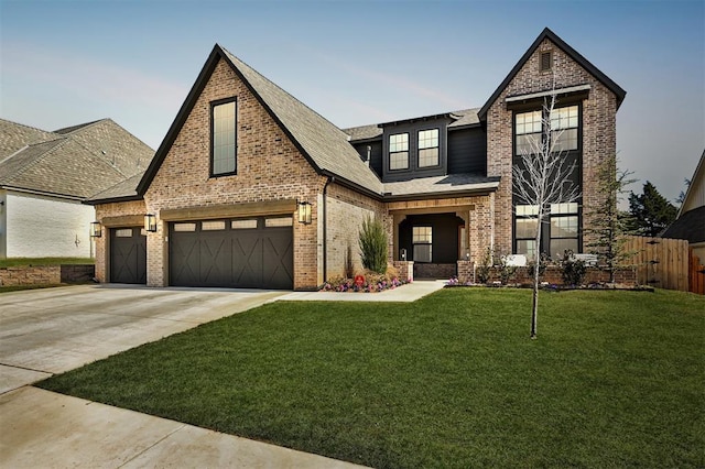 3824 Stone Hill Ln, Edmond, OK 73034 - view of front of house featuring concrete driveway, brick siding, a shingled roof, and an attached garage