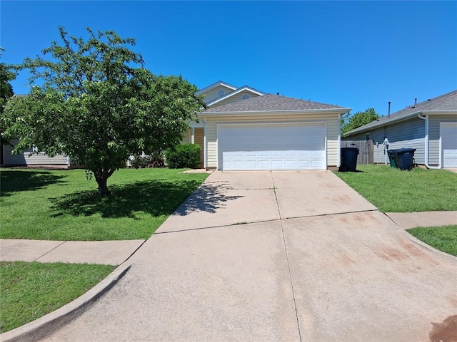 14817 Moon Daisy Dr, Edmond, OK 73013 - ranch-style house featuring a garage, fence, and a front lawn