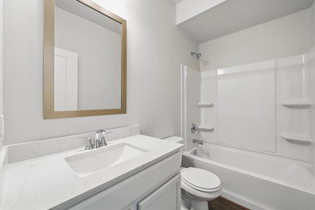 full bathroom with vanity, shower / bathing tub combination, and toilet