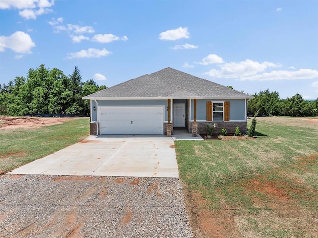 view of front of home featuring concrete driveway, brick siding, a front yard, and a garage