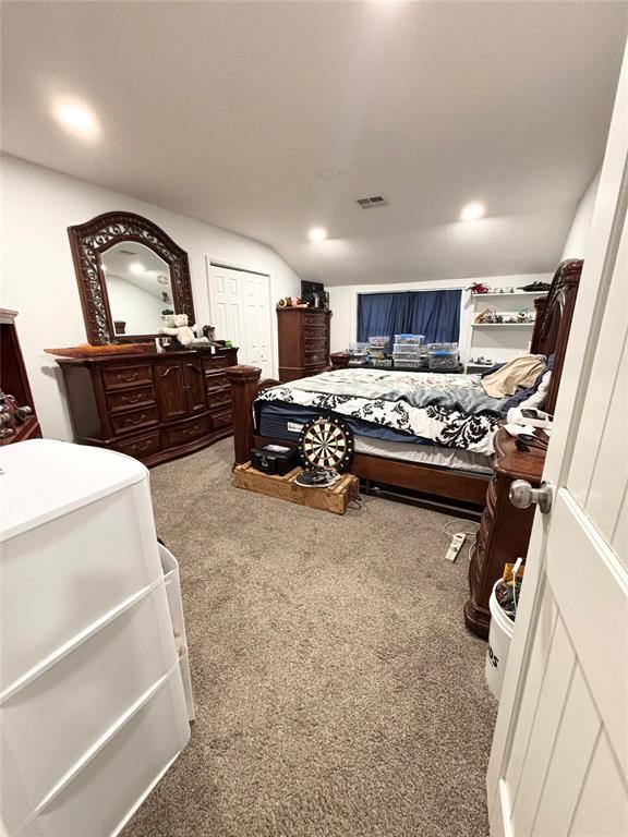 9737 NE State Highway 15, Shattuck, OK 32911 - carpeted bedroom featuring recessed lighting and visible vents
