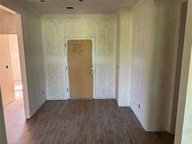 unfurnished room featuring wood finished floors