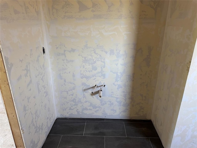 interior space featuring tile patterned floors and wallpapered walls