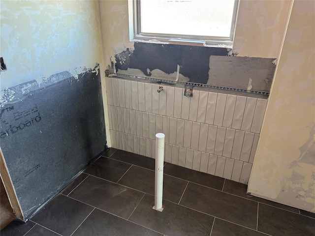 bathroom with tile patterned flooring