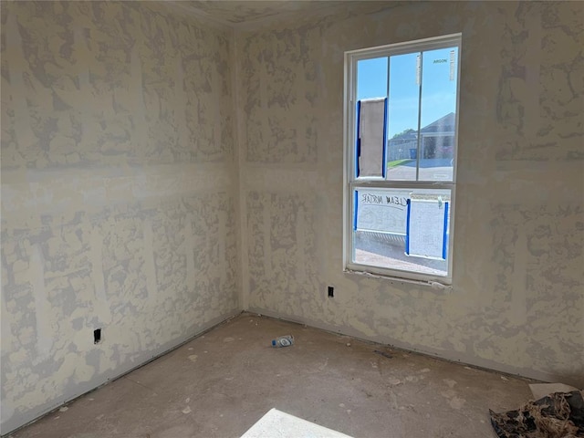 unfurnished room featuring a healthy amount of sunlight