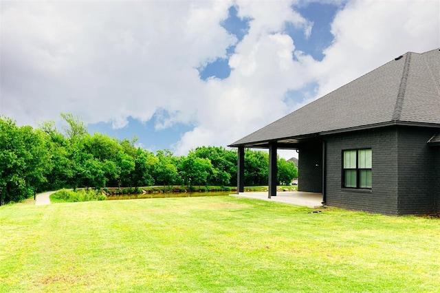 11813 NW 108th Pl, Yukon, OK 73099 - view of grassy yard with a patio