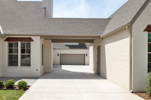 exterior space with concrete driveway