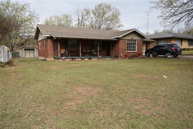 ranch-style home featuring crawl space, a porch, a front yard, fence, and brick siding