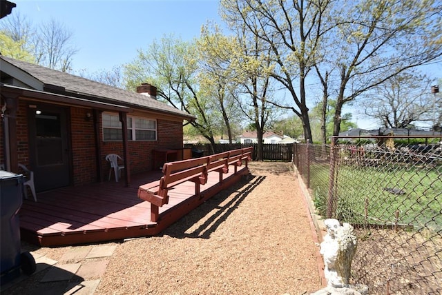 view of yard featuring a fenced backyard and a wooden deck