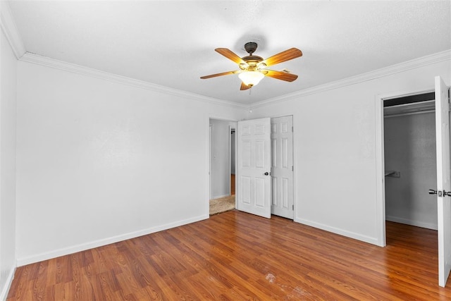 120 E 6th St, Stratford, OK 74872 - unfurnished bedroom featuring crown molding and wood finished floors