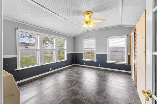 120 E 6th St, Stratford, OK 74872 - spare room with baseboards, vaulted ceiling, and a ceiling fan