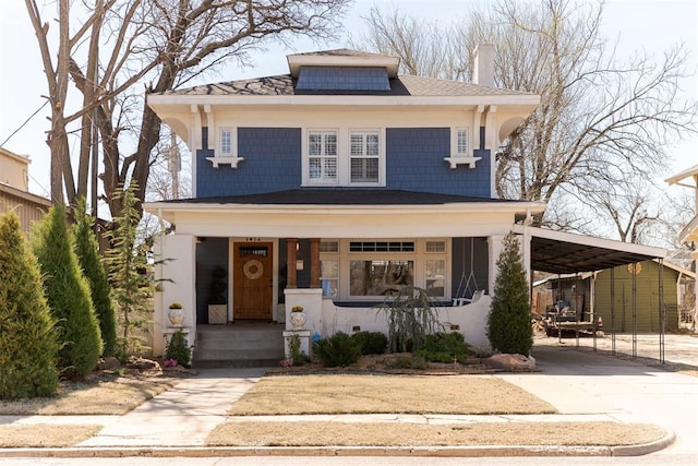 1412 NW 34th St, Oklahoma City, OK 73118 - traditional style home featuring a carport, driveway, a chimney, and covered porch