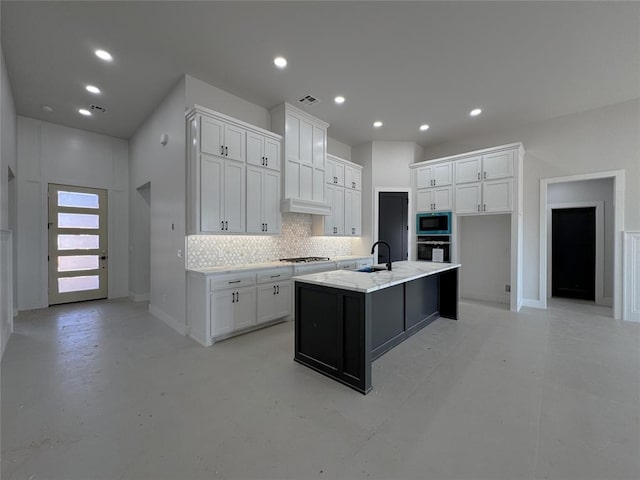 7120 NW 155th St, Edmond, OK 73013 - kitchen with white cabinets, concrete flooring, a sink, stainless steel appliances, and tasteful backsplash