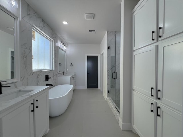 7120 NW 155th St, Edmond, OK 73013 - full bathroom featuring visible vents, a shower stall, and a sink