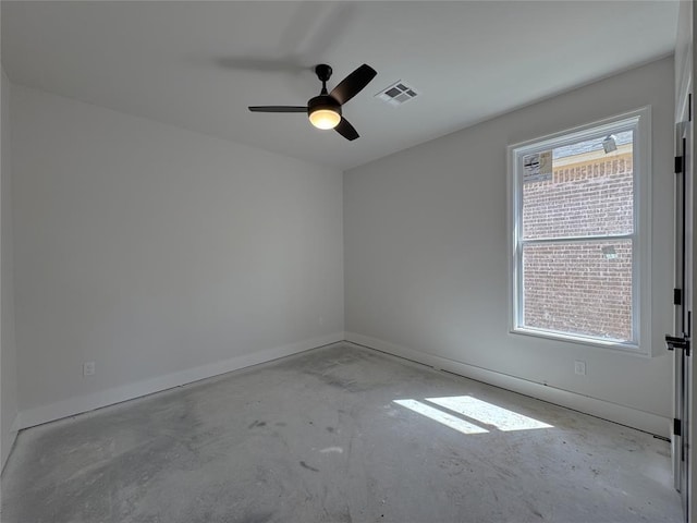 7120 NW 155th St, Edmond, OK 73013 - unfurnished room with visible vents, a ceiling fan, baseboards, and unfinished concrete flooring