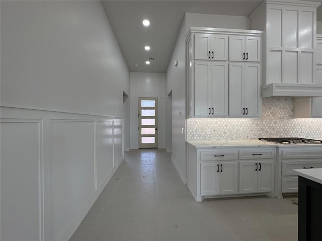 7120 NW 155th St, Edmond, OK 73013 - hallway with a decorative wall, recessed lighting, baseboards, and finished concrete flooring