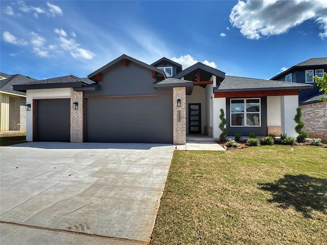 7120 NW 155th St, Edmond, OK 73013 - prairie-style home featuring a shingled roof, an attached garage, a front lawn, brick siding, and concrete driveway