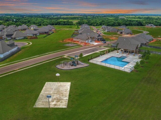 birds eye view of property with a residential view