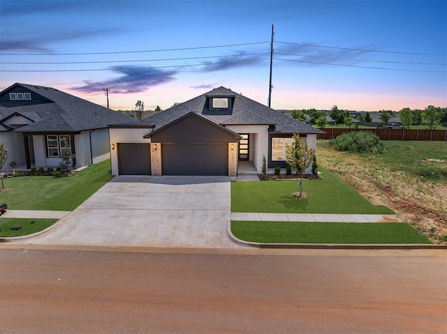 15600 Rockwell Park Ln, Edmond, OK 73013 - view of front of house with a garage, driveway, and a shingled roof