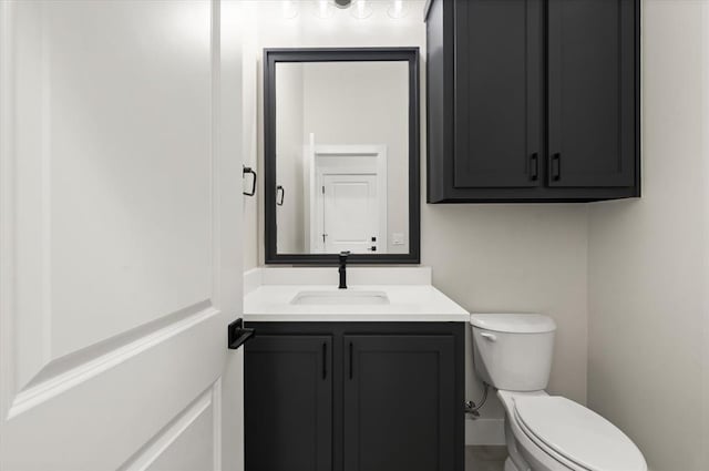 15600 Rockwell Park Ln, Edmond, OK 73013 - bathroom with vanity and toilet