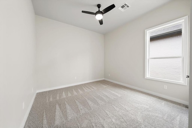 15600 Rockwell Park Ln, Edmond, OK 73013 - empty room with carpet flooring and a ceiling fan