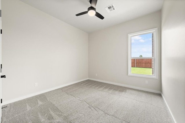 15600 Rockwell Park Ln, Edmond, OK 73013 - carpeted empty room with baseboards and ceiling fan