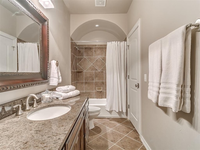 1109 Salvo Bridge Ct, Edmond, OK 73034 - full bath featuring vanity, tile patterned flooring, and shower / bathtub combination with curtain